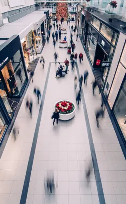 Busy multi-level shopping mall atrium